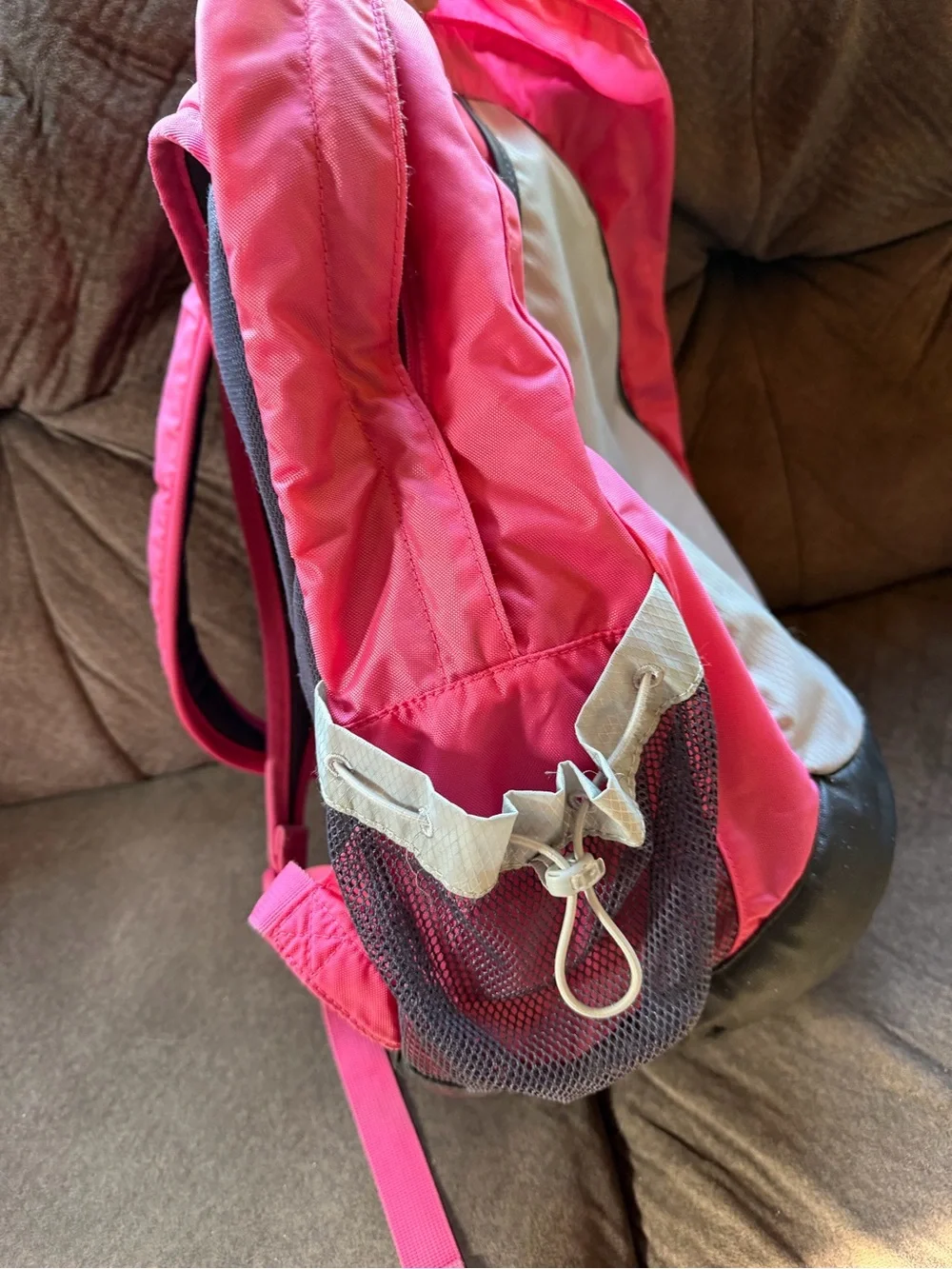 Pink and grey Nike backpack
